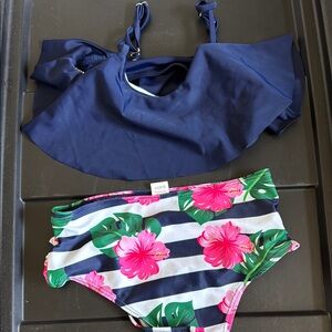 Two sets of children's swimsuits